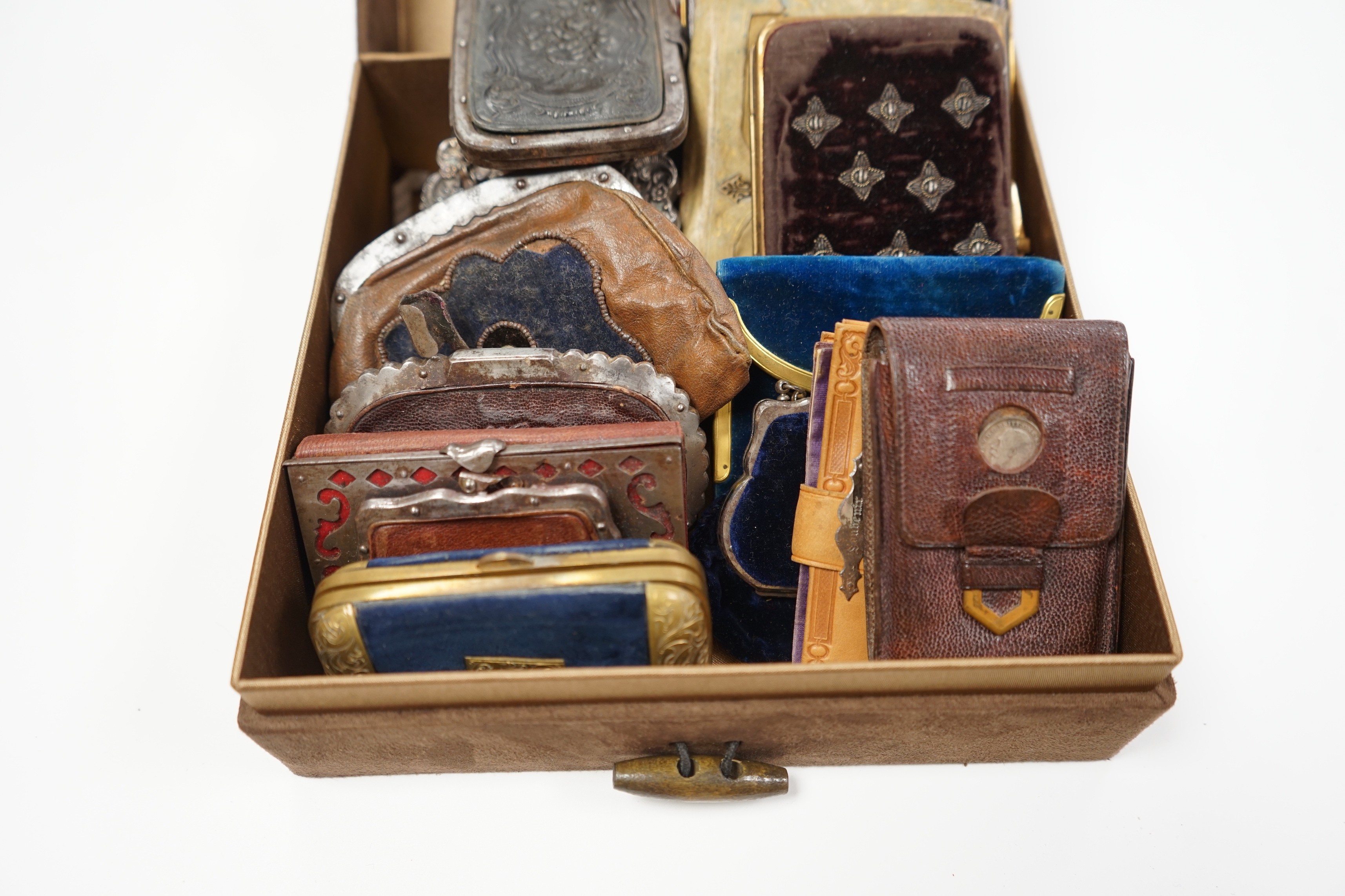 A collection of early 19th century and later embroidered, petite point, leather cut steel and velvet purses card cases etc